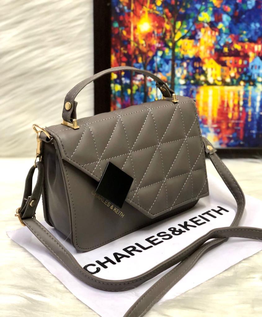 Chic Minimalism: Small Sling with Front Cut Design